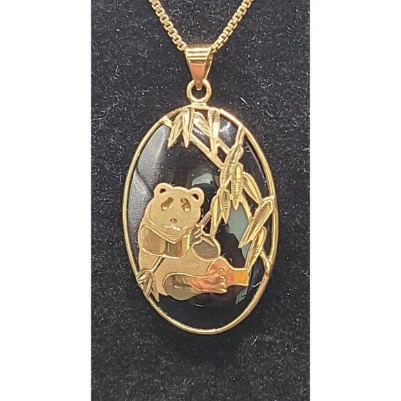 18 K GoldPanda Pendant on Smoky Quartz